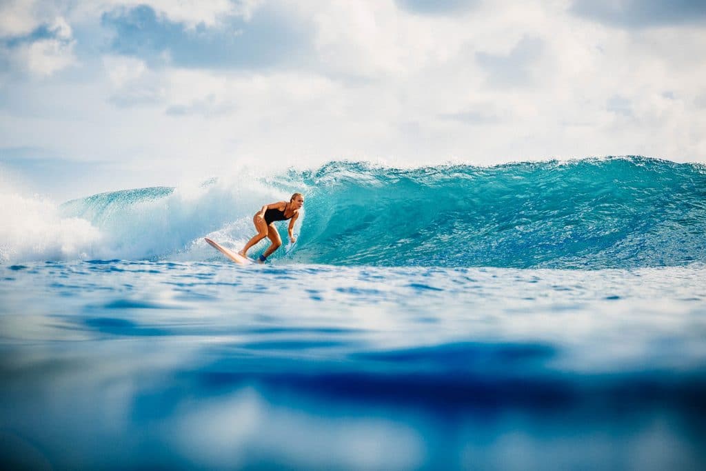 Female surfer on a left-hand wave