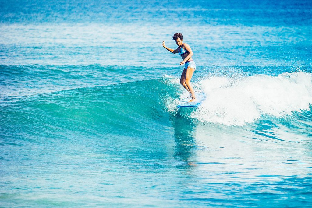 Female surfer on a right-hand wave
